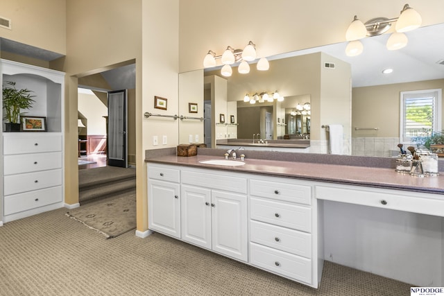 9826 Harney Pkwy N, Omaha, NE 68114 - bathroom featuring vanity and a towering ceiling