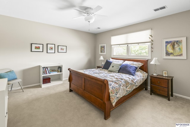 9826 Harney Pkwy N, Omaha, NE 68114 - bedroom with light colored carpet, baseboards, and ceiling fan