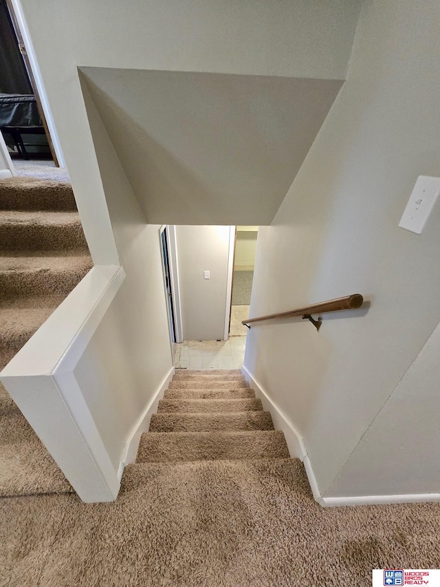 1241 Bessie St, Goehner, NE 68364 - stairs with carpet and baseboards