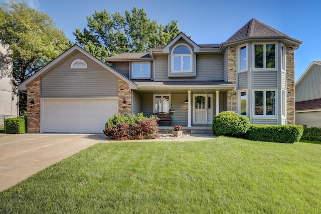 1014 Hickory Hill Rd, Papillion, NE 68046 - view of front of property with a garage, concrete driveway, covered porch, a front lawn, and a shingled roof