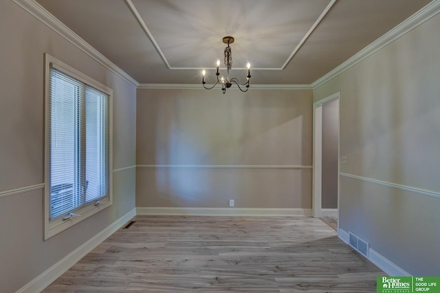 1014 Hickory Hill Rd, Papillion, NE 68046 - unfurnished dining area with a chandelier, wood finished floors, crown molding, and baseboards