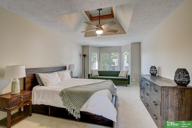 1014 Hickory Hill Rd, Papillion, NE 68046 - bedroom with light carpet, a textured ceiling, and a ceiling fan