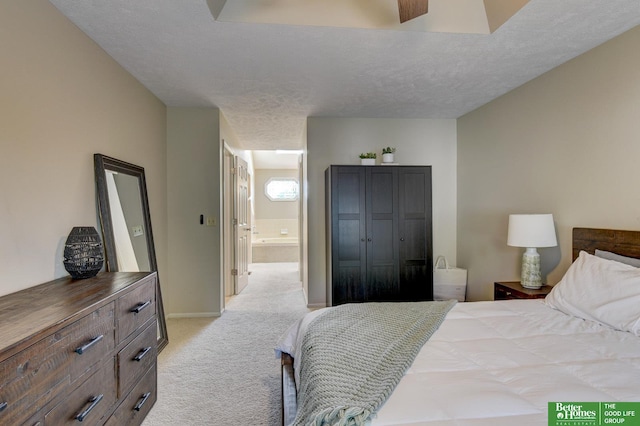 1014 Hickory Hill Rd, Papillion, NE 68046 - bedroom featuring light colored carpet, baseboards, and a textured ceiling