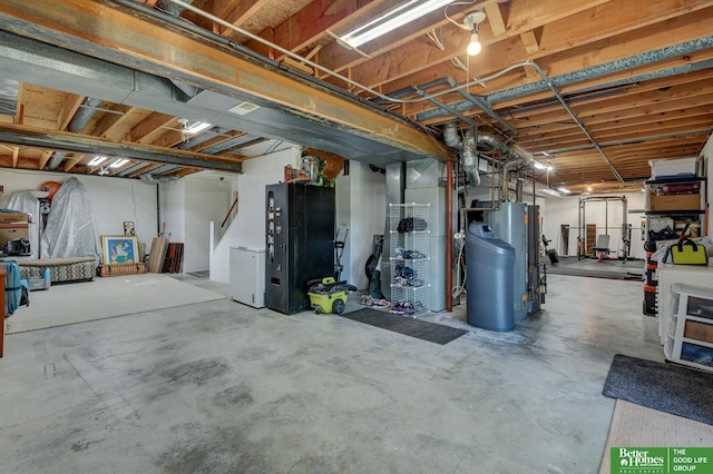 1014 Hickory Hill Rd, Papillion, NE 68046 - unfinished basement with gas water heater, fridge, a water softener, and heating unit