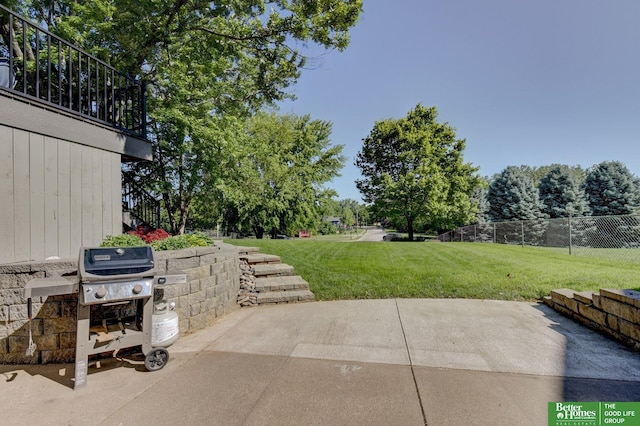 1014 Hickory Hill Rd, Papillion, NE 68046 - view of patio / terrace with grilling area, stairway, and view of wooded area