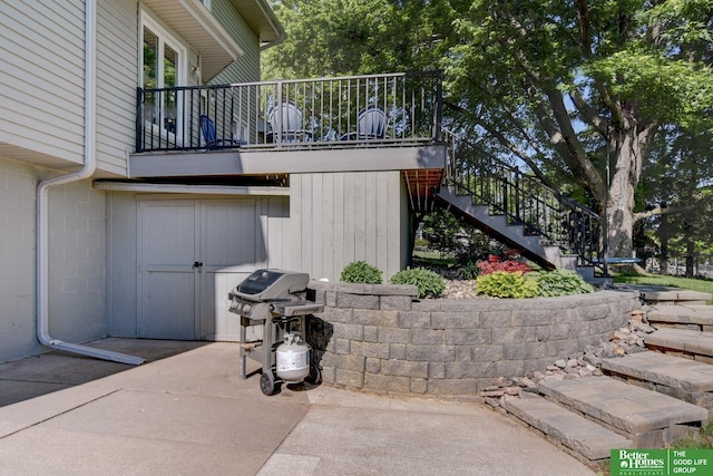 1014 Hickory Hill Rd, Papillion, NE 68046 - view of patio / terrace featuring stairs, grilling area, and a balcony