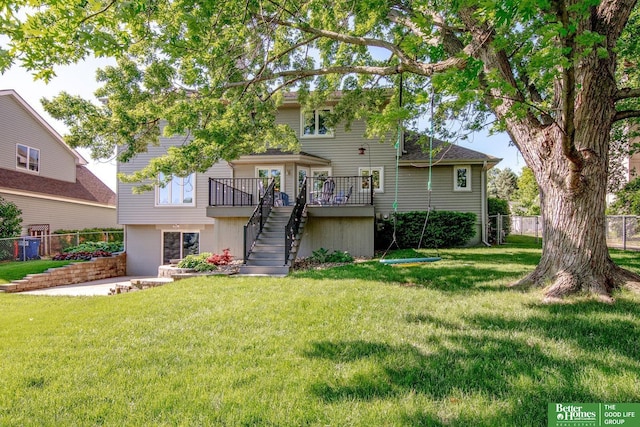 1014 Hickory Hill Rd, Papillion, NE 68046 - back of property with stairs and a deck