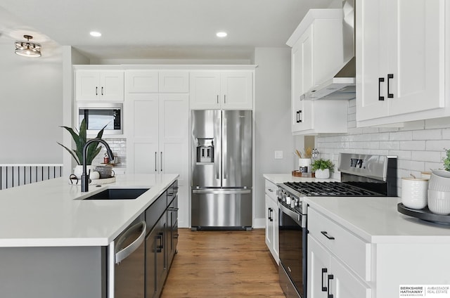 8218 N 167th Ave, Bennington, NE 68007 - kitchen with stainless steel appliances, a sink, wall chimney exhaust hood, light countertops, and decorative backsplash