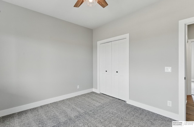 8218 N 167th Ave, Bennington, NE 68007 - unfurnished bedroom with carpet, baseboards, a closet, and a ceiling fan