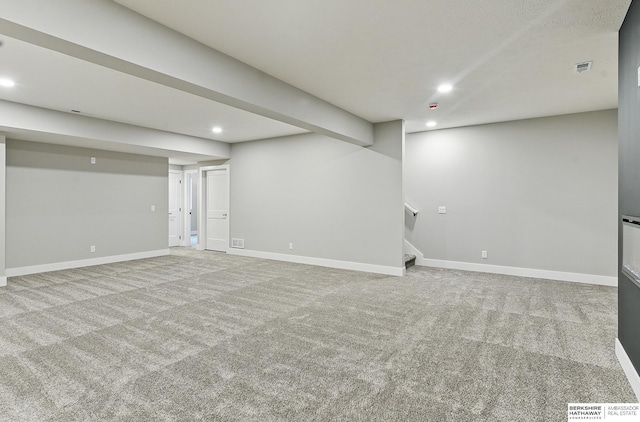 8218 N 167th Ave, Bennington, NE 68007 - finished basement featuring recessed lighting, carpet flooring, stairway, and baseboards