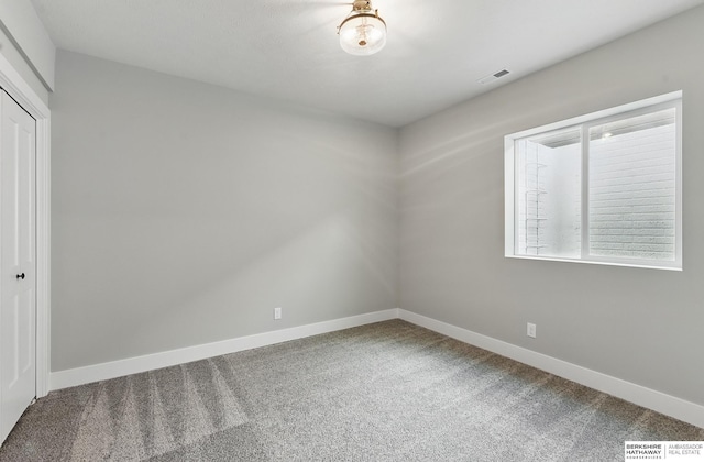 8218 N 167th Ave, Bennington, NE 68007 - unfurnished bedroom featuring carpet flooring, baseboards, and a closet