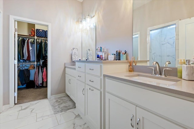 12601 S 78th St, Papillion, NE 68046 - full bath featuring marble finish flooring, vanity, a spacious closet, and a shower