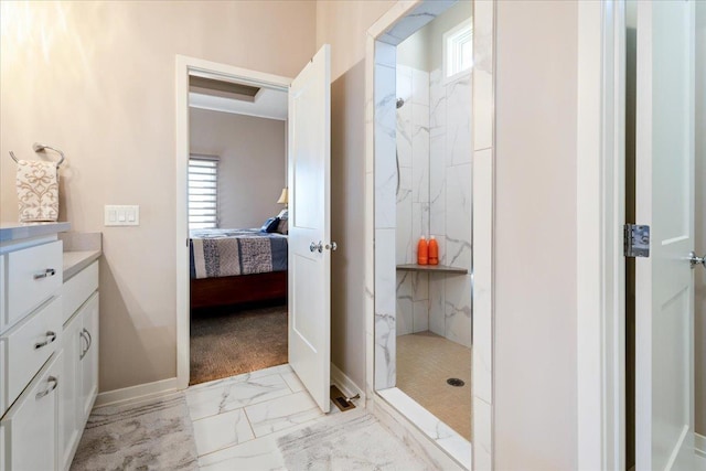 12601 S 78th St, Papillion, NE 68046 - ensuite bathroom with marble look tile flooring, healthy amount of natural light, and a marble finish shower