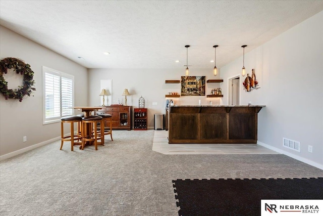 12601 S 78th St, Papillion, NE 68046 - kitchen with light carpet, baseboards, decorative light fixtures, light stone counters, and recessed lighting