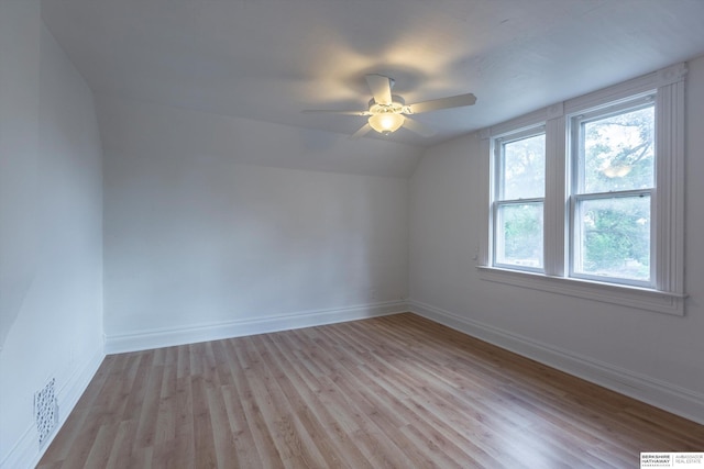 425 W Eagle St, Arlington, NE 68002 - additional living space with lofted ceiling, light wood-type flooring, a ceiling fan, and baseboards