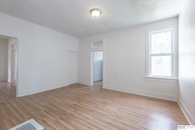 425 W Eagle St, Arlington, NE 68002 - spare room featuring light wood-style flooring and baseboards