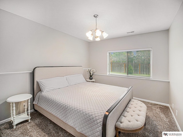 9656 White Pine Rd, Lincoln, NE 68505 - carpeted bedroom with baseboards and a chandelier