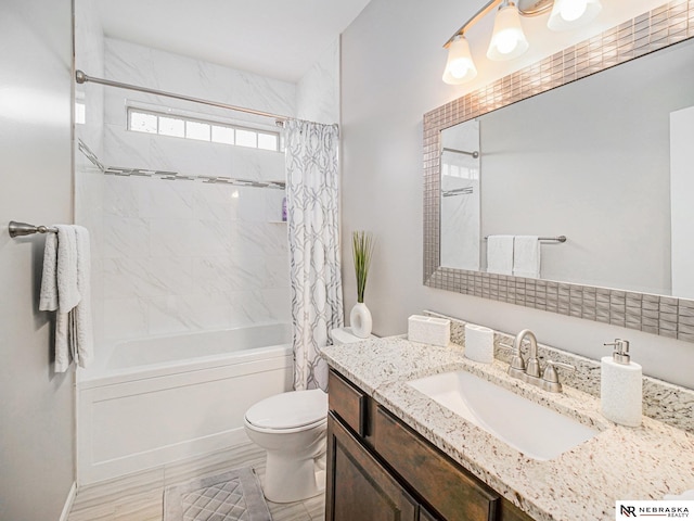 9656 White Pine Rd, Lincoln, NE 68505 - full bathroom with shower / tub combo, toilet, and vanity