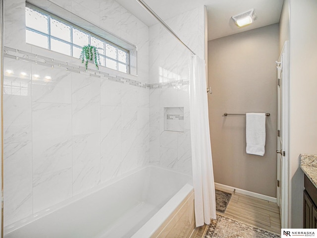 9656 White Pine Rd, Lincoln, NE 68505 - full bath featuring shower / bath combination with curtain, vanity, and baseboards