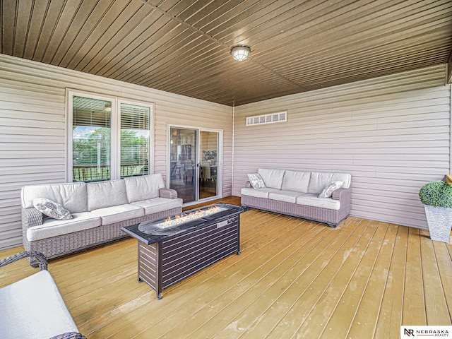 9656 White Pine Rd, Lincoln, NE 68505 - deck featuring an outdoor living space with a fire pit