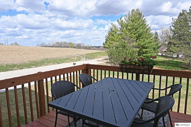 4401 Leawood Dr, Bellevue, NE 68123 - wooden terrace with outdoor dining space and a view of countryside