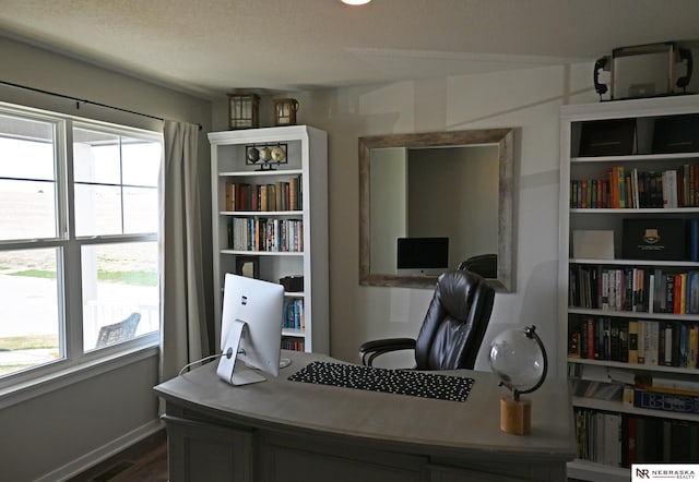 4401 Leawood Dr, Bellevue, NE 68123 - office space featuring dark wood-type flooring and baseboards