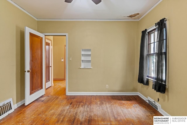 5101 Maple St, Omaha, NE 68104 - unfurnished room with ornamental molding, hardwood / wood-style flooring, ceiling fan, and baseboards