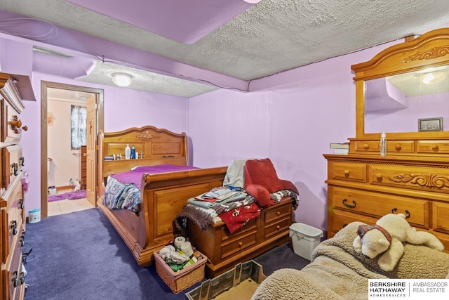 5101 Maple St, Omaha, NE 68104 - bedroom with a textured ceiling, carpet floors, and tile patterned flooring
