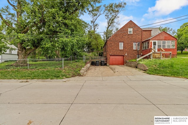 5101 Maple St, Omaha, NE 68104 - view of home's exterior featuring driveway and a garage