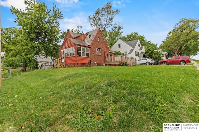 5101 Maple St, Omaha, NE 68104 - view of grassy yard with a deck