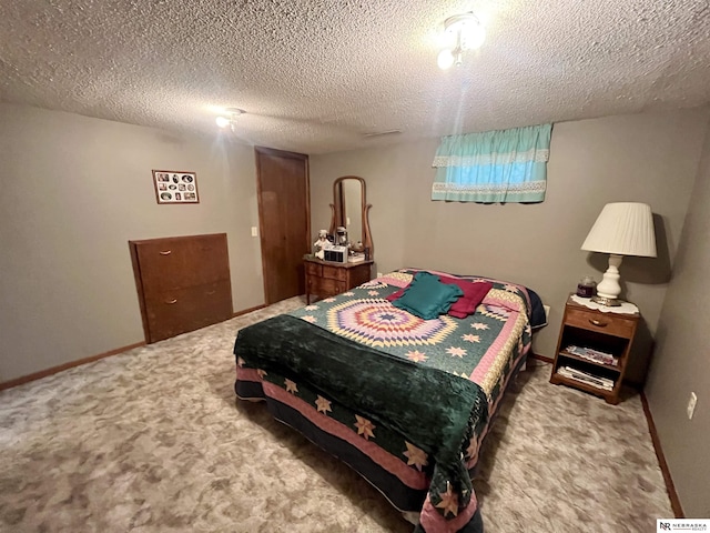 606 E 7th St, Valentine, NE 69201 - carpeted bedroom featuring a textured ceiling and baseboards