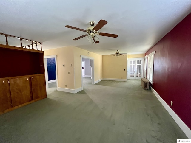 238 N Ray St, Valentine, NE 69201 - carpeted empty room featuring radiator, baseboards, and ceiling fan