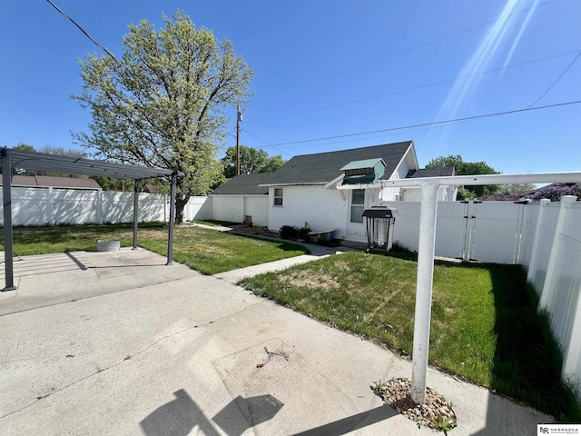 238 N Ray St, Valentine, NE 69201 - view of yard featuring a patio area and a gate