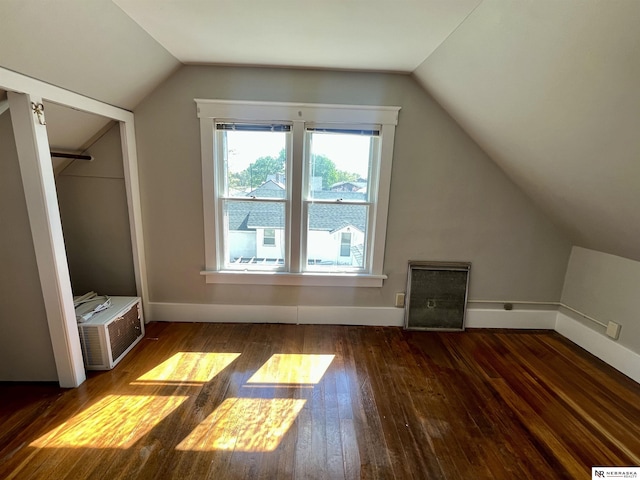 238 N Ray St, Valentine, NE 69201 - additional living space featuring wood-type flooring, vaulted ceiling, and baseboards