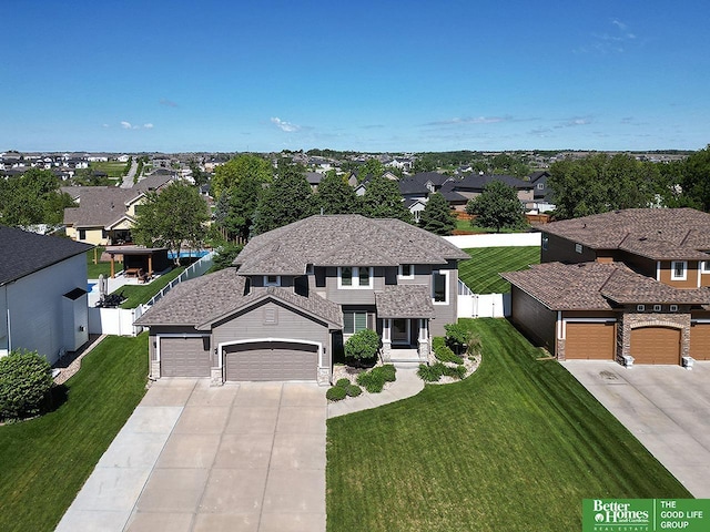 7968 N 163rd Ave, Bennington, NE 68007 - view of front of house with a residential view, driveway, and a garage