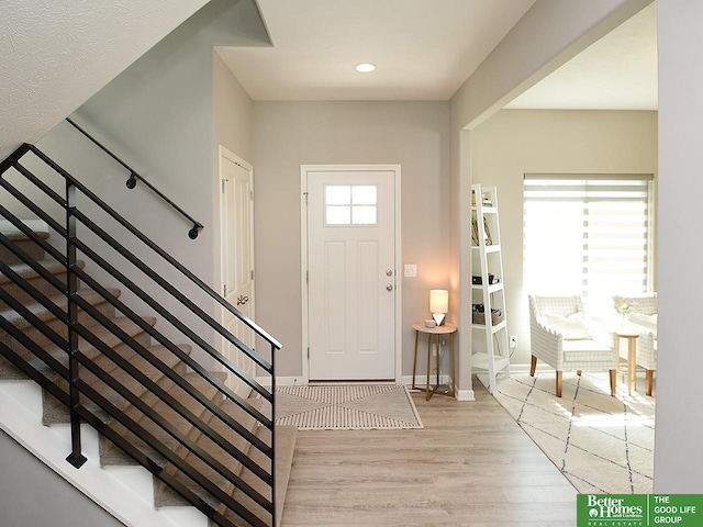 7968 N 163rd Ave, Bennington, NE 68007 - foyer featuring light wood-style floors, stairs, baseboards, and recessed lighting