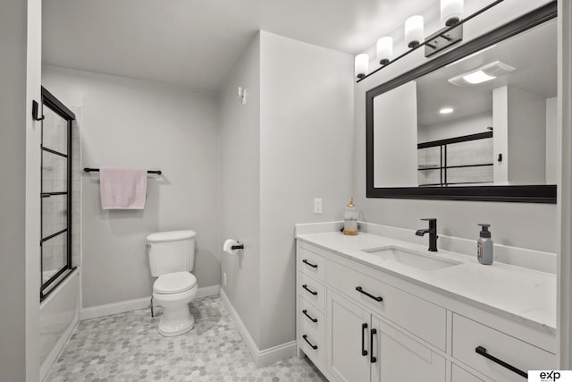 1346 G St, Pawnee City, NE 68420 - full bath featuring baseboards, toilet, vanity, and shower / bath combination with glass door
