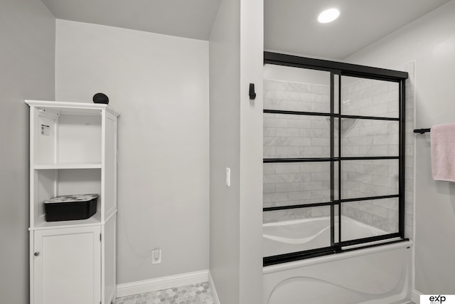 1346 G St, Pawnee City, NE 68420 - bathroom featuring baseboards and bath / shower combo with glass door