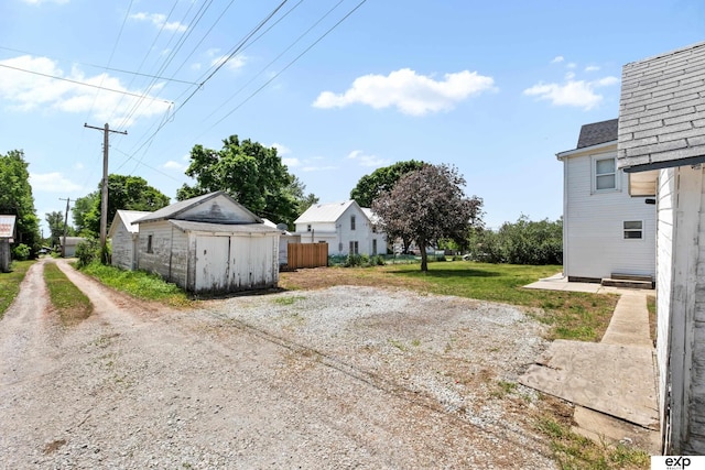 1346 G St, Pawnee City, NE 68420 - view of yard with driveway
