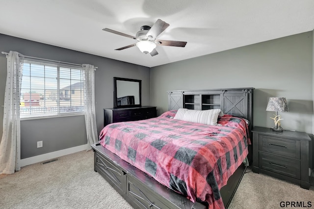 4441 W Hub Hall Dr, Lincoln, NE 68528 - bedroom with light colored carpet, baseboards, and ceiling fan