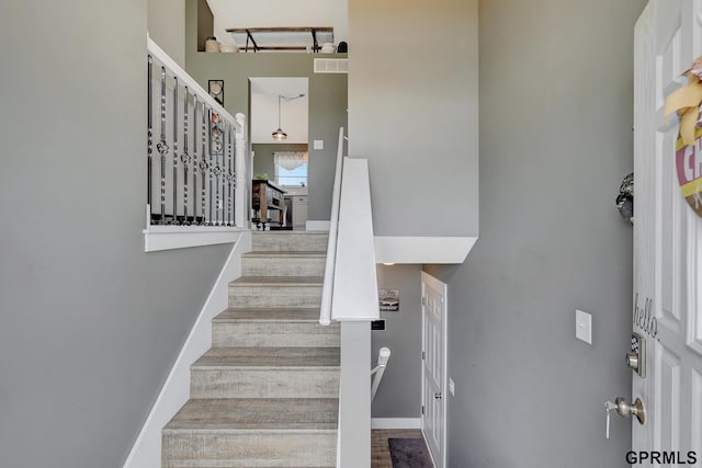 4441 W Hub Hall Dr, Lincoln, NE 68528 - staircase featuring a high ceiling