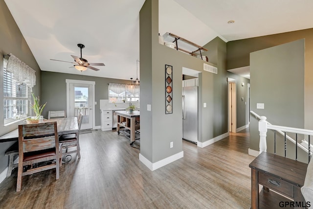 4441 W Hub Hall Dr, Lincoln, NE 68528 - interior space with vaulted ceiling, wood finished floors, ceiling fan, and baseboards