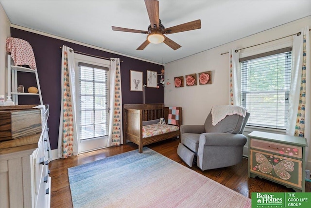 2028 N 55th St, Omaha, NE 68104 - bedroom with wood finished floors and a ceiling fan