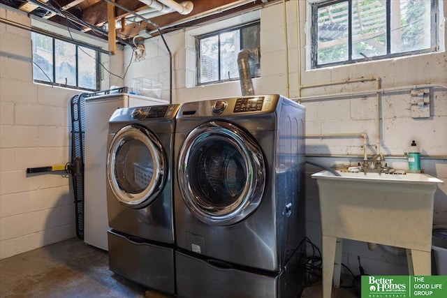 2028 N 55th St, Omaha, NE 68104 - washroom featuring independent washer and dryer and healthy amount of natural light