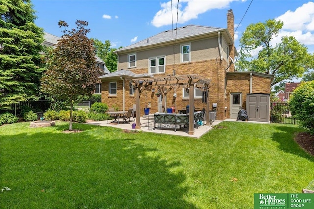 2028 N 55th St, Omaha, NE 68104 - back of house with a pergola, a patio, a chimney, and brick siding