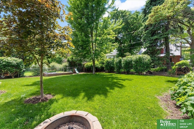 2028 N 55th St, Omaha, NE 68104 - view of yard featuring a fire pit