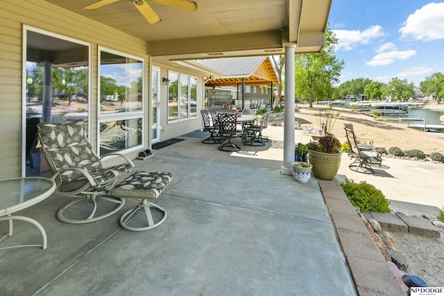 S-1196 N Lake Shore Dr, Fremont, NE 68025 - view of patio featuring ceiling fan and outdoor dining area