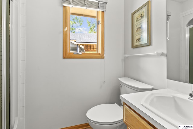 S-1196 N Lake Shore Dr, Fremont, NE 68025 - full bath with vanity, toilet, and a shower with shower door