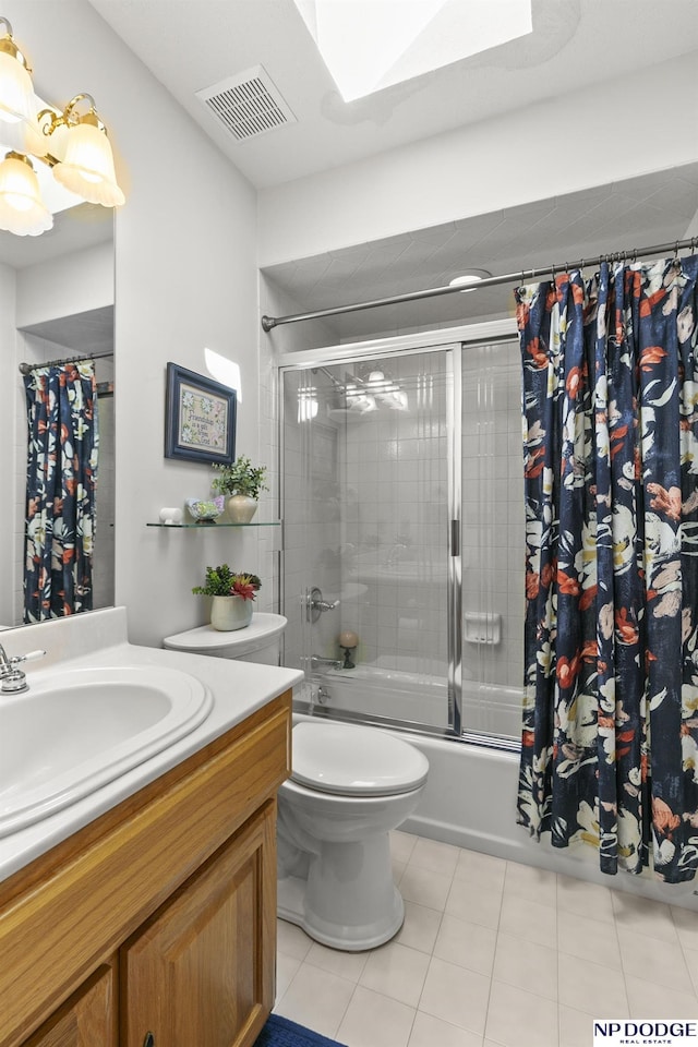 S-1196 N Lake Shore Dr, Fremont, NE 68025 - bathroom with vanity, shower / tub combo with curtain, toilet, and tile patterned floors
