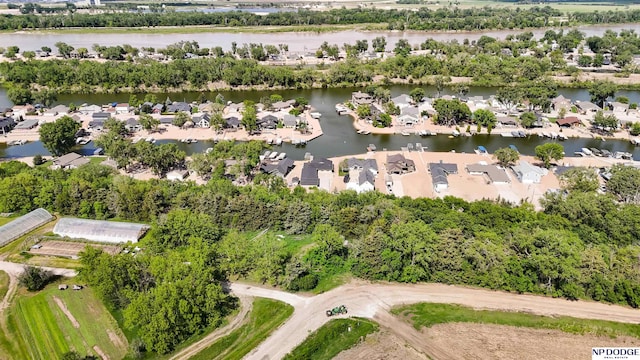S-1196 N Lake Shore Dr, Fremont, NE 68025 - aerial perspective of suburban area with a nearby body of water and a tree filled landscape